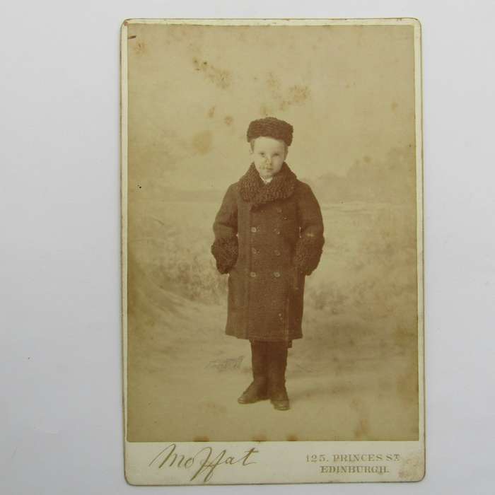 Antique photo of young boy in winter clothes taken by Moffat of Edinburgh