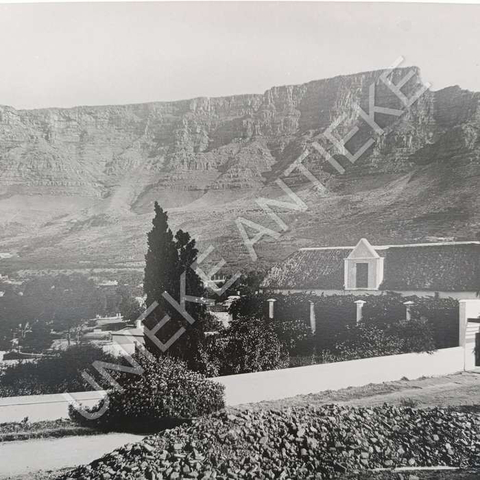 Antique photo reprint of Tamboerskloof farm house with Table Mountain in back