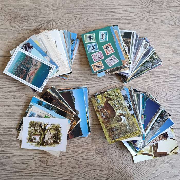 Large lot of over 200 Postcards - used and unused