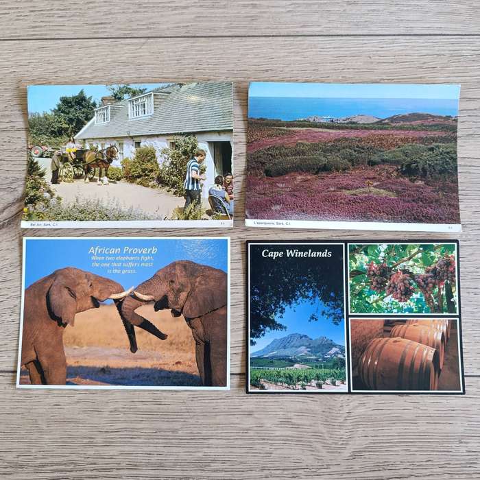 Large lot of over 200 Postcards - used and unused