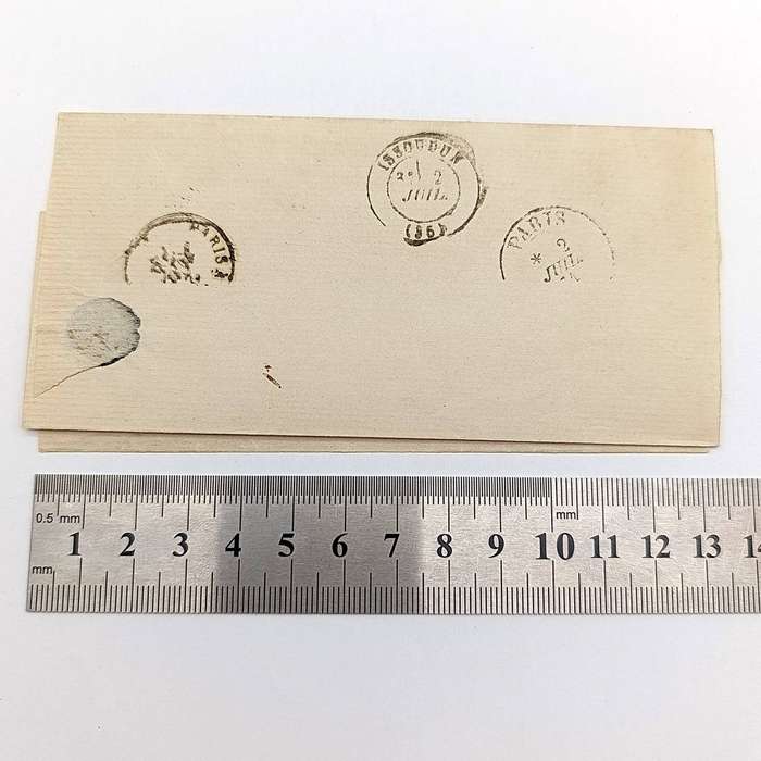 Postal History 1874 wrapper with French 25c stamp to Coulain, Ivory - received date at back is 1864