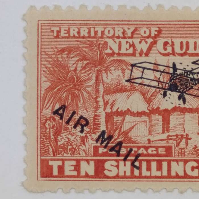 New Guinea ten shilling airmail stamp - mounted mint