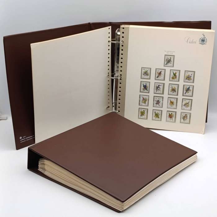 Lot of 2 Albums with over 600  Ciskei mint unhinged and used stamps on cover - 1981 and later