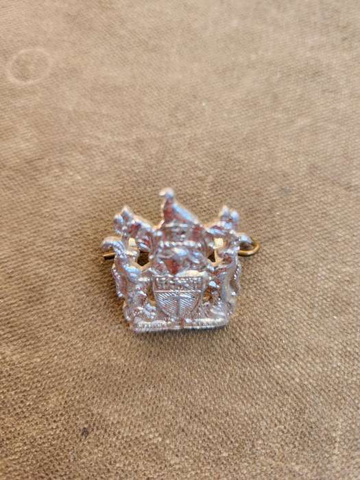 100% original less common & not often seen Rhod coat-of-arms stay-brite type badge used by many Govt