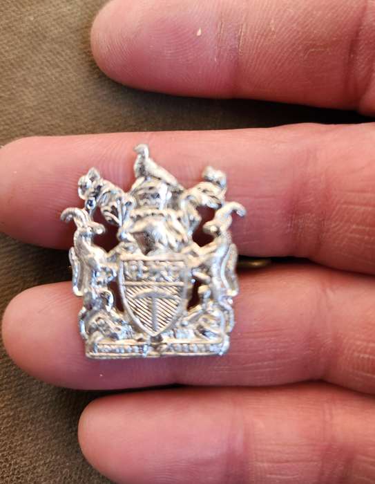 100% original less common & not often seen Rhod coat-of-arms stay-brite type badge used by many Govt