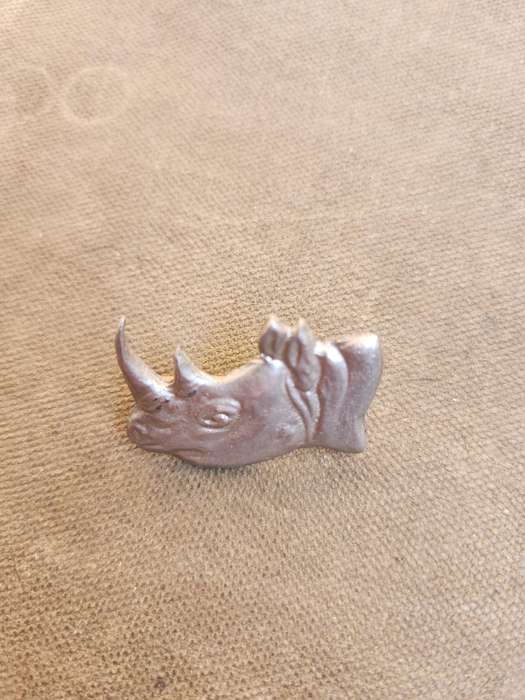 rarely seen original Rhodesia period 2 Brigade (rhino) metal cap badge (with lugs) - from the commem