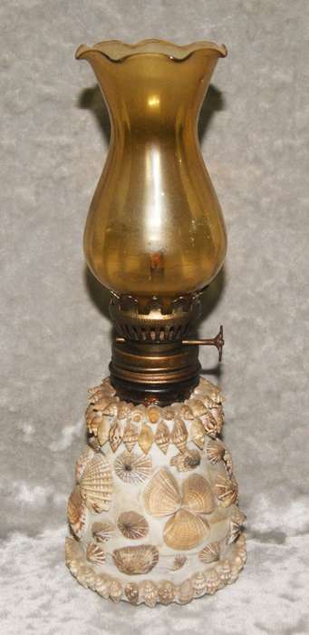 Vintage oil lamp with amber glass flue