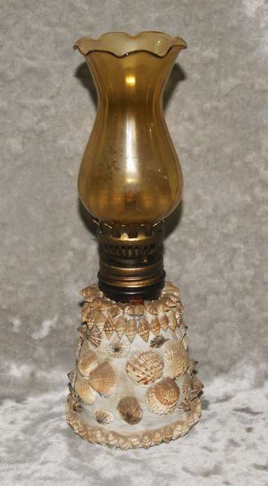 Vintage oil lamp with amber glass flue