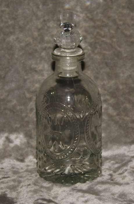 Moulded glass olive oil bottle