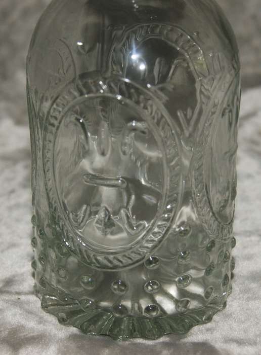 Moulded glass olive oil bottle