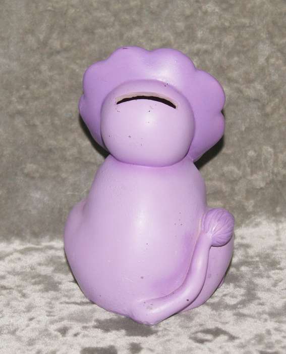 Purple lion money box