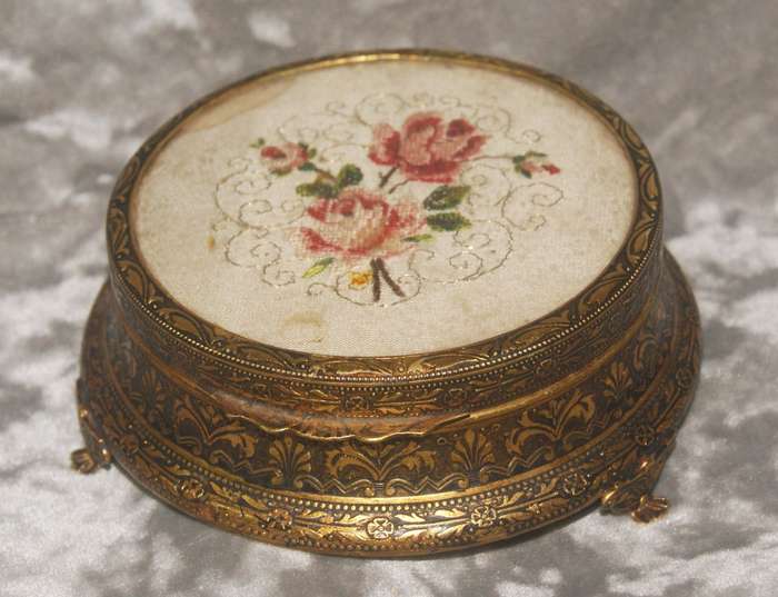 Brass footed high relief trinket box with needlepoint on lid