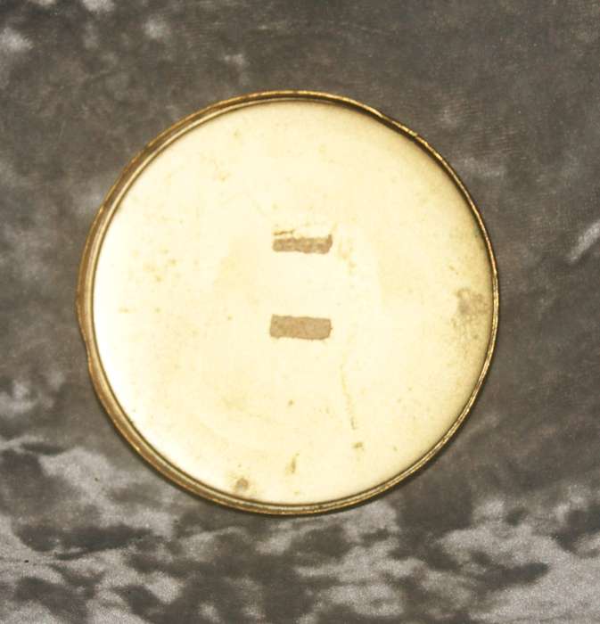Brass high relief needlepoint lid