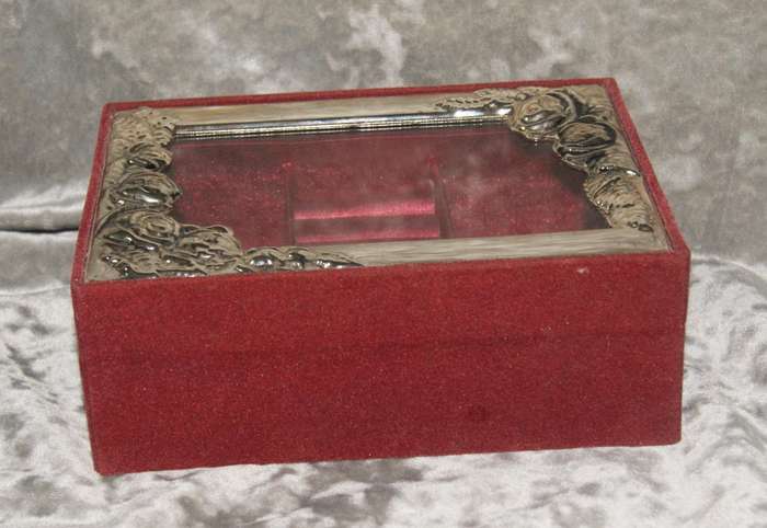 Velvet covered jewellery box with silver plate and glass lid