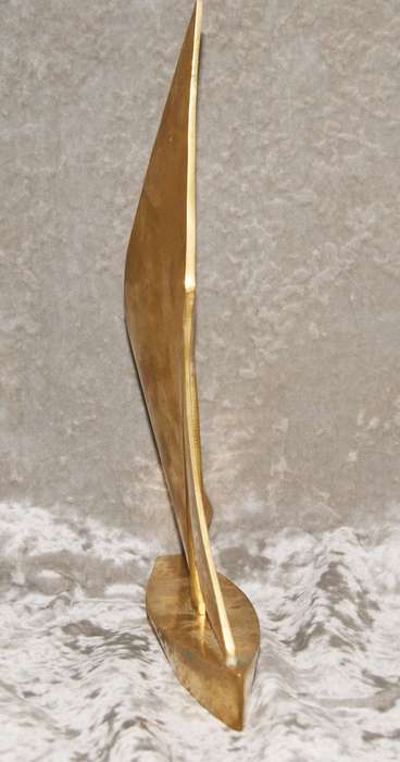 Large brass sailing boat (yacht)