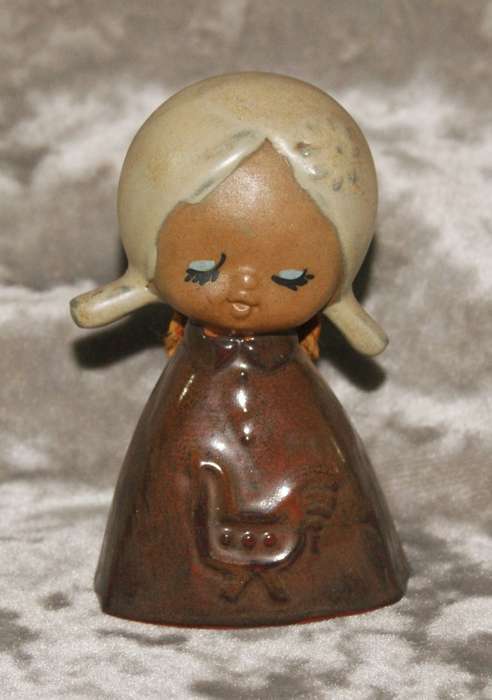 Vintage glazed stoneware girl figurine bell