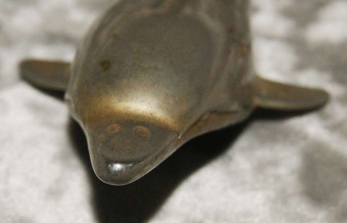Silver plated dolphin bottle opener