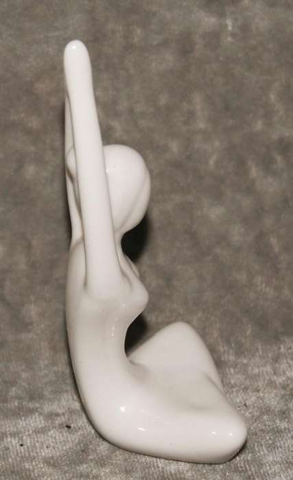 Meditation pose ceramic figurine