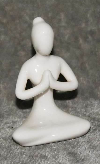 Meditation pose ceramic figurine