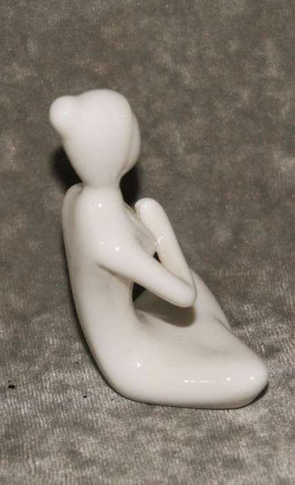 Meditation pose ceramic figurine