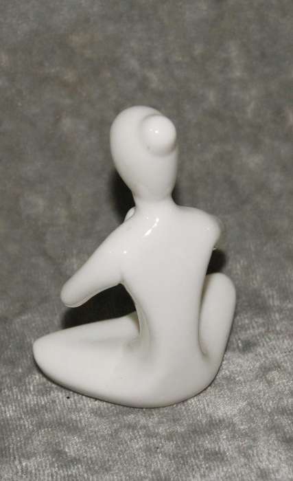 Meditation pose ceramic figurine