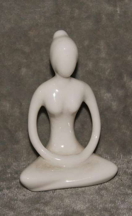 Meditation pose ceramic figurine