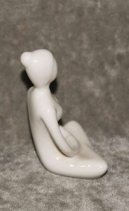 Meditation pose ceramic figurine