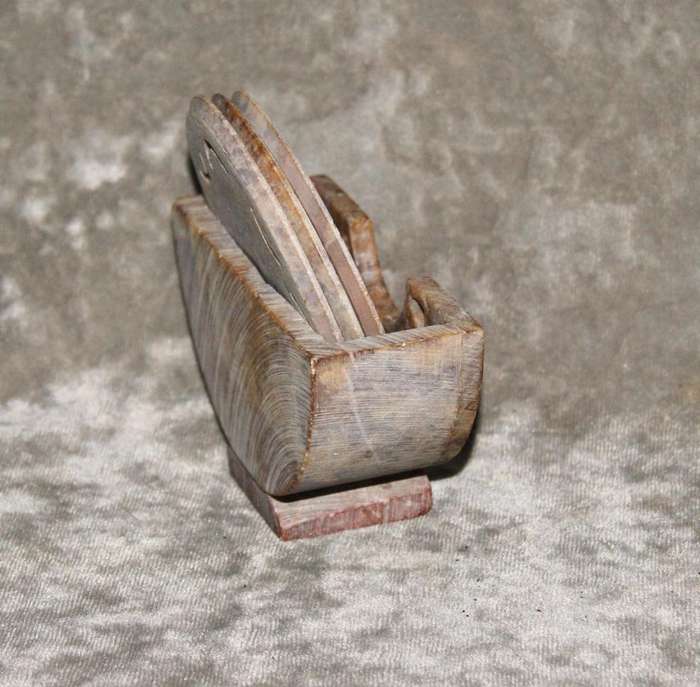 Set of 3 hand carved stone coasters in holder