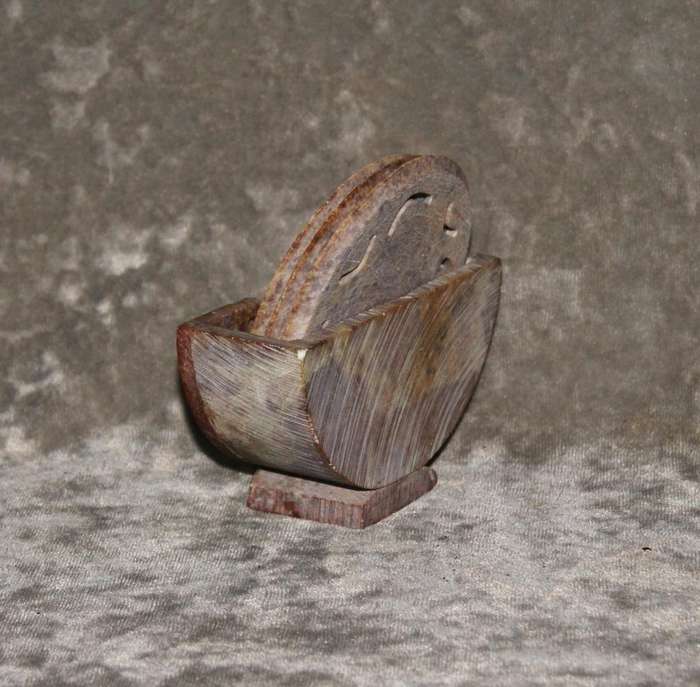 Set of 3 hand carved stone coasters in holder