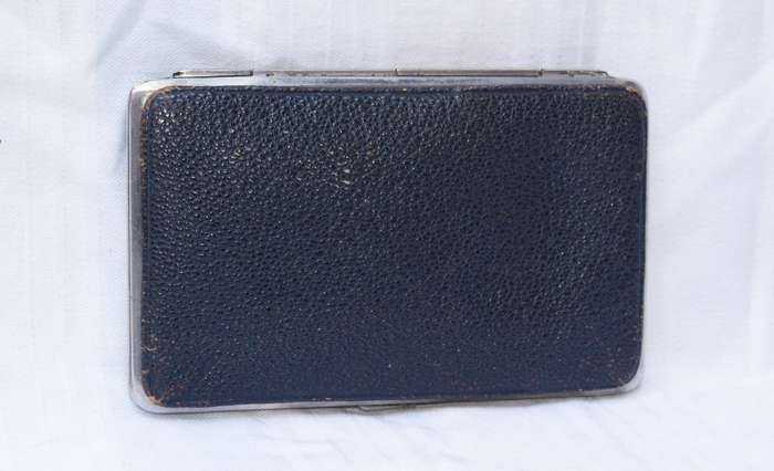 Vintage leather and chrome wallet