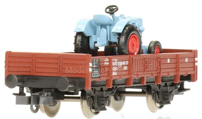 H0 gge 1/87 83mm DB low-sided wagon loaded w. Fahr Tractor, mint in orig.box Roco 47824