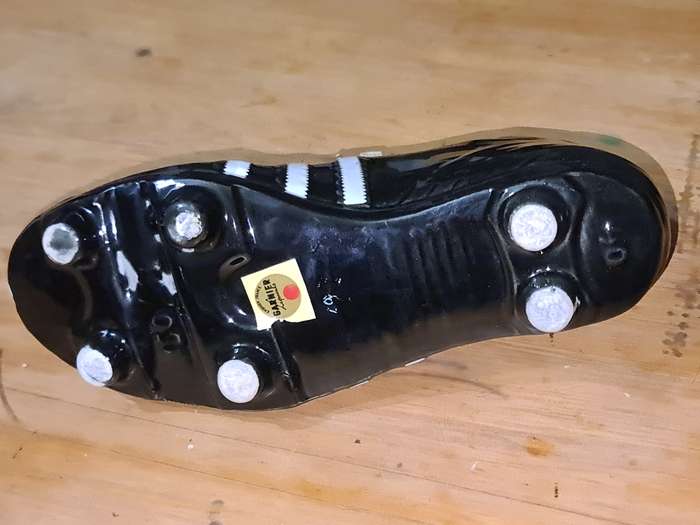 Liquor bottle in the shape of a rugby boot
