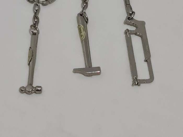 Three miniature tools keyrings