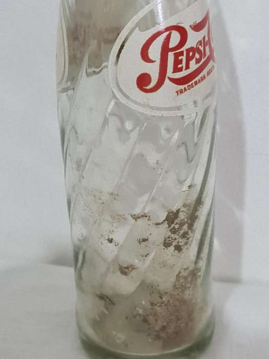 X4 Differant size and age Pepsi Cola bottles.