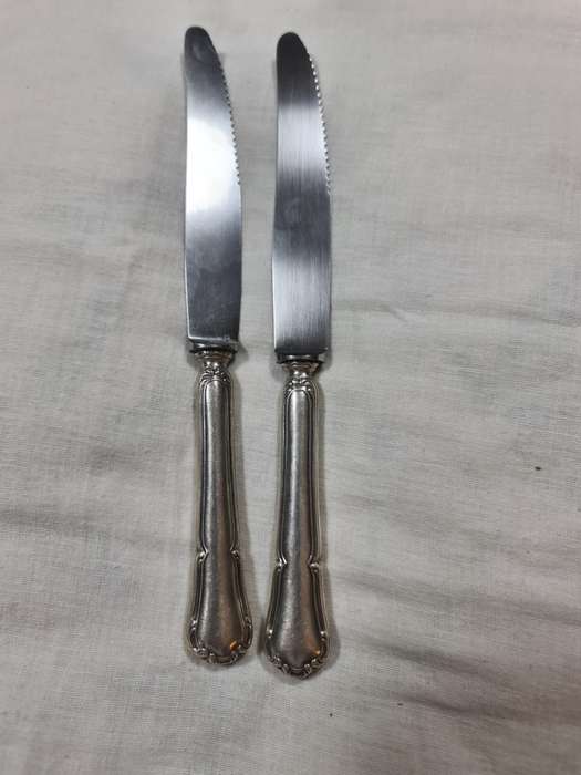 Two J.A. Henkles (WMF) knifes. Handles monogramed