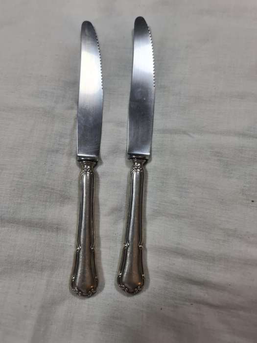 Two J.A. Henkles (WMF) knifes. Handles monogramed