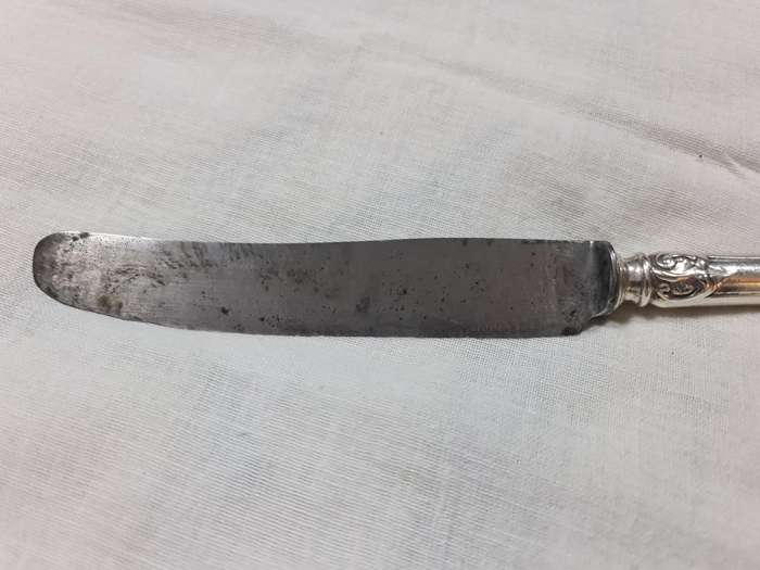 Knife with ornate handle