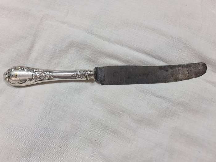 Knife with ornate handle