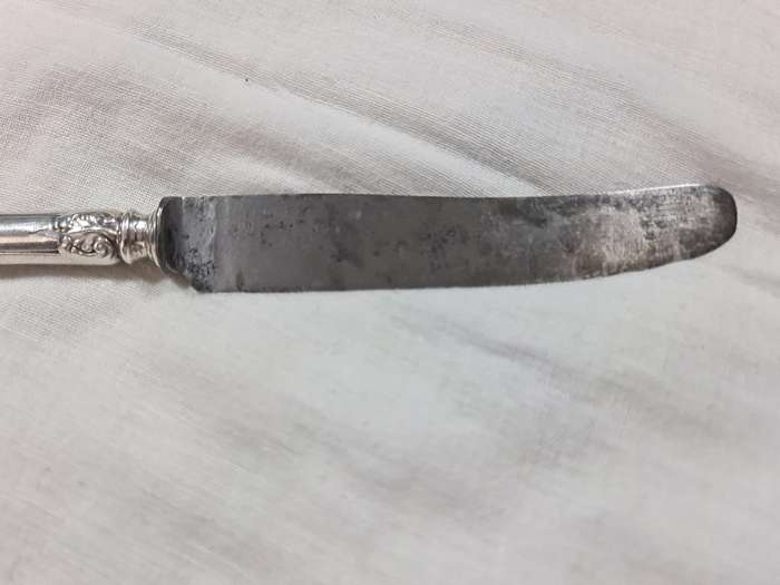 Knife with ornate handle