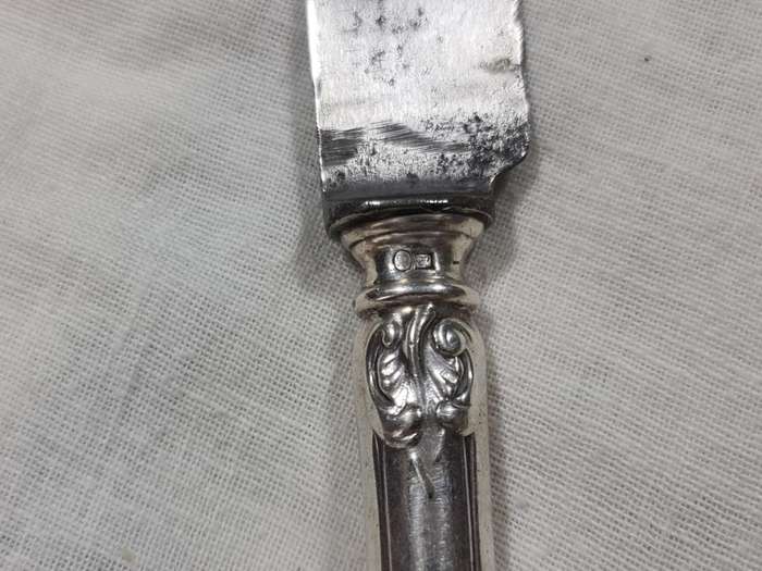 Knife with ornate handle