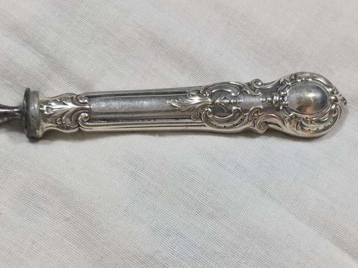 Stunning fork with ornate Handle