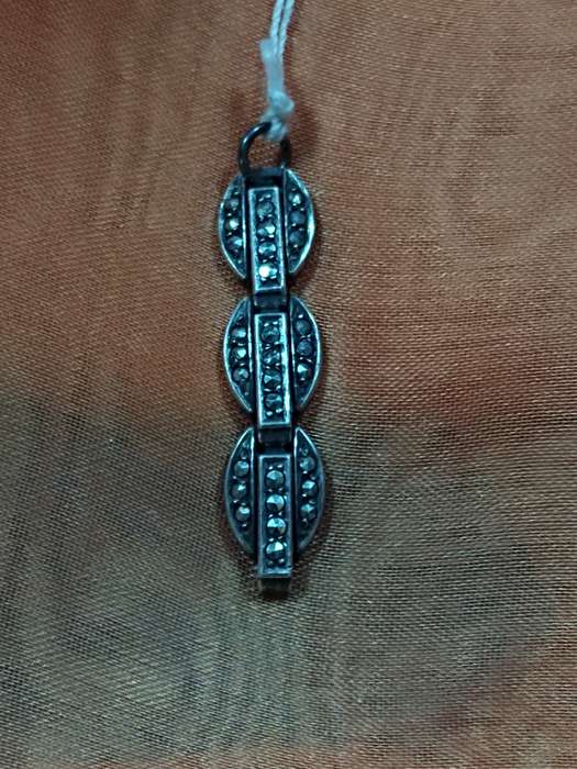 Silver tone marcasite pendant