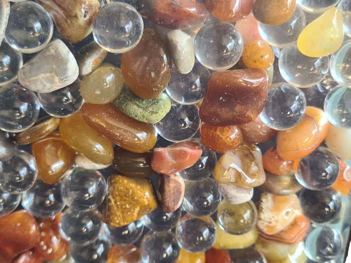 Glass holder with Gemstones and clear Glass marbles.