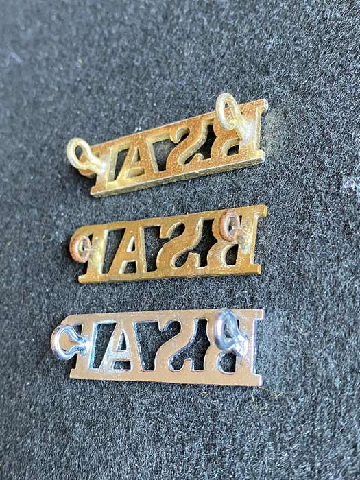 RHODESIA BSA POLICE TITLE BRASS,ANODISED AND CHROME-ONE OF EACH LUGS INTACT