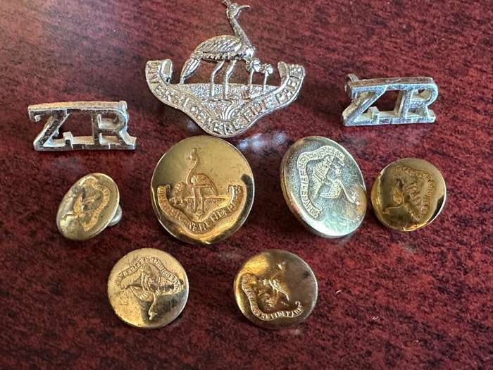 Northern Rhodesia police and Regiment lot. Sold together.