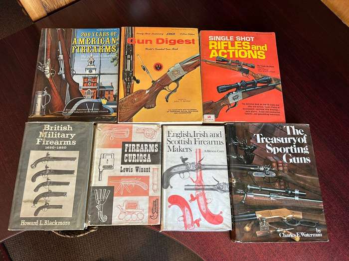Selection of 7 firearm books. Sold together used but still good condition.