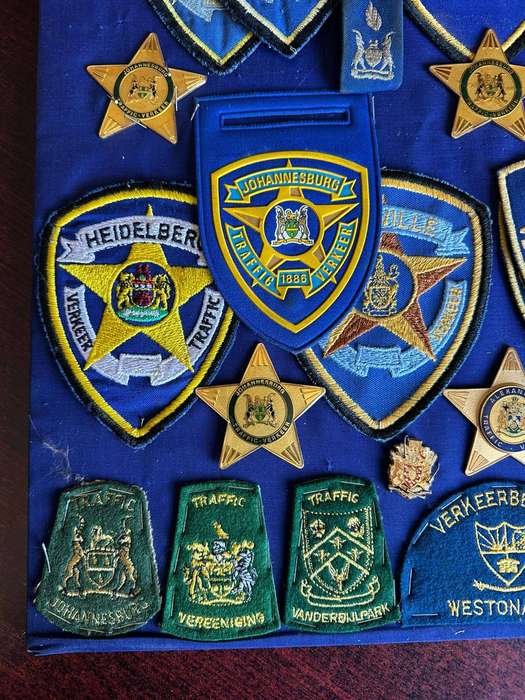 Large selection of traffic police badges and patches. Sold as one lot.