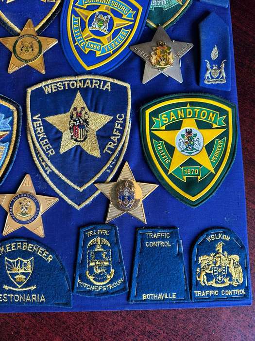 Large selection of traffic police badges and patches. Sold as one lot.
