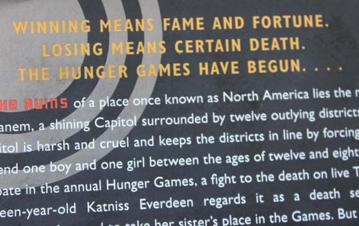 THE HUNGER GAMES by Suzanne Collins.
