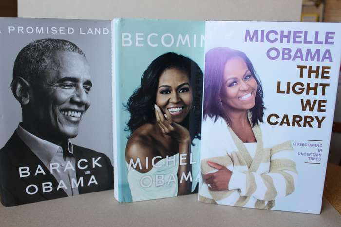 A PROMISED LAND by Barack Obama, BECOMING  AND THE LIGHT WE CARRY by Michelle Obama